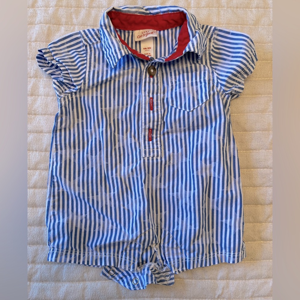 Blue striped one piece with stars in background and red color